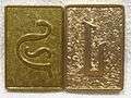 Battlestar Galactica Cubit Prop. Set of 2. Battlestar Galactica (1978 TV series). Obverse Side. Showing stylized Initial "G" (left), stylized Initial "L" (right),.jpg