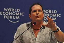 Carlos Vives, speaking.