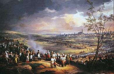 Colored painting showing Napoleon receiving the surrender of General Mack, with the city of Ulm in the background.