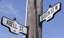 Street signs for Queen Street West and Abell Street, in West Queen West.