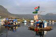 Colourful rafts on a lake
