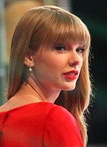 Taylor Swift looking directly toward the camera.