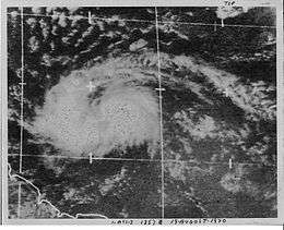 Satellite image of a large area of clouds to the east of the Lesser Antilles