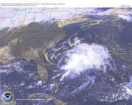A satellite photo shows a large cloud to the southwest of Bermuda
