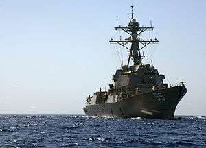 A grey ship on the seas.