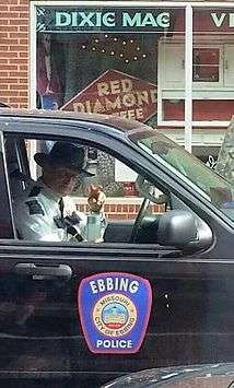 Woody Harrelson outside Dixie Mae Vintage Market on Main Street Sylva, NC