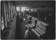 Row of key fitters at the Cable Company factory.